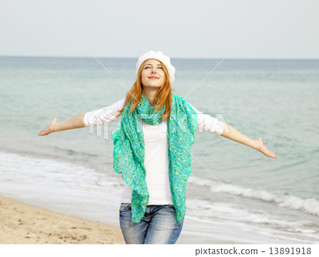 Young beautiful girl at the beach. Young beautiful girl at the beach. 13891918