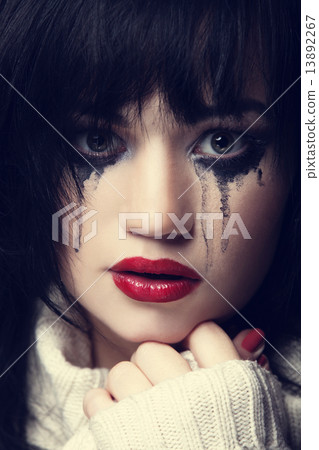 Portrait of a sad brunette. 13892267