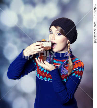 Lovely girl in sweater with cake. Lovely girl in sweater with cake. 13892632
