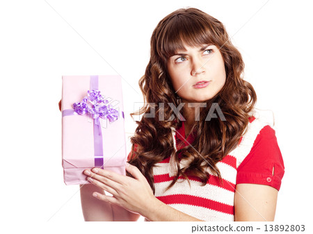 Surprised brunette girl with present box. 13892803