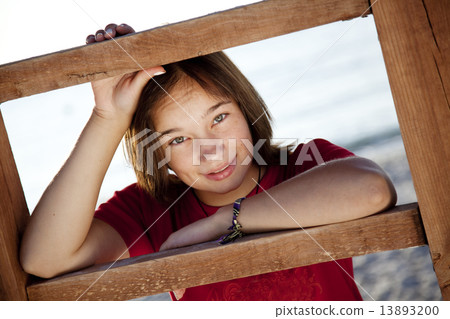 Portrait of beautiful brunet girl 13893200