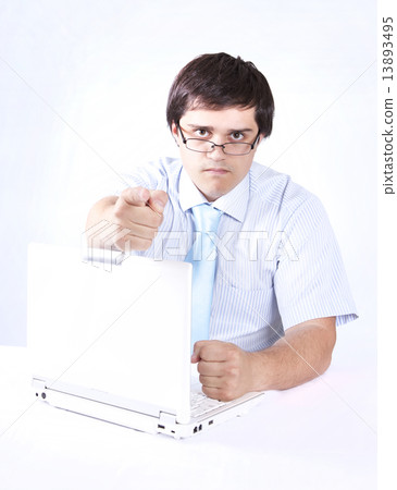 Young boss with white laptop. 13893495
