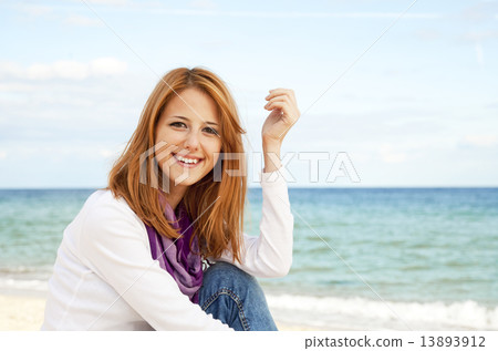 Young beautiful girl at the beach Young beautiful girl at the beach 13893912