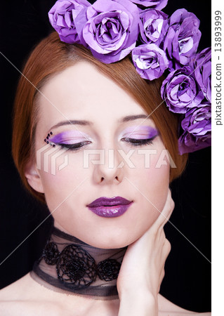 Portrait of beautiful redhead girl with style make-up and flower 13893999