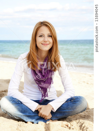 Young beautiful girl at the beach. 13894045
