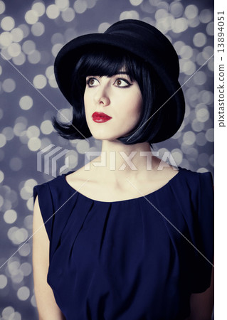 Portrait of a beautiful girl in hat. Portrait of a beautiful girl in hat. 13894051