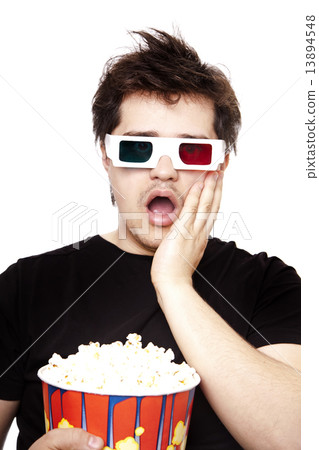 Funny men in stereo glasses with popcorn. 13894548