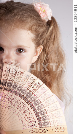 Portrait of beautiful young girl with fan Portrait of beautiful young girl with fan 13894911