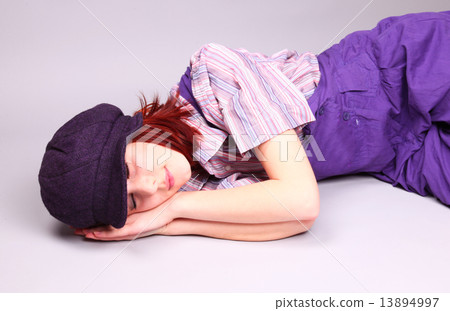 Beautiful girl sleeping at floor Beautiful girl sleeping at floor 13894997