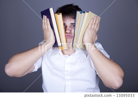 Tired men with books. Tired men with books. 13895033