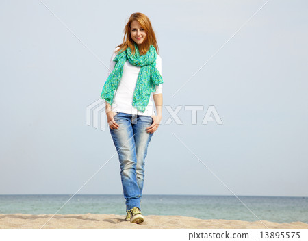 Young beautiful girl at the beach Young beautiful girl at the beach 13895575