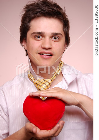 Beautiful boy with toy heart. 13895630