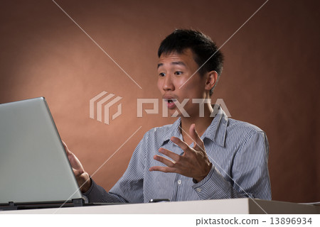 Surprised Chinese business man Surprised Chinese business man 13896934