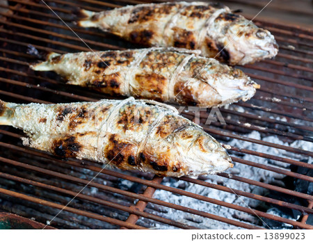Grilling fish 13899023