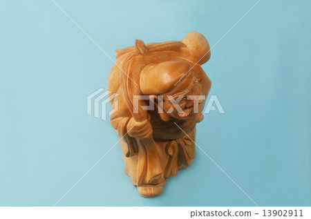 Stock Photo: the god of wealth, daikokuten, woodcarving