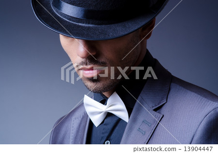 Businessman in old style hat 13904447