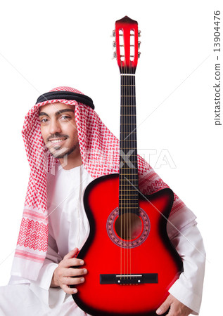 Arab man playing guitar isolated on white Arab man playing guitar isolated on white 13904476