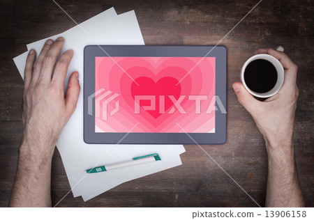 Heart shape backgound on tablet 13906158