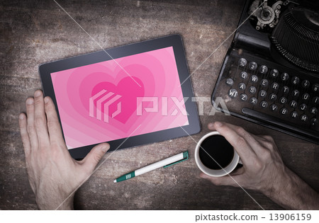 Heart shape backgound on tablet Heart shape backgound on tablet 13906159