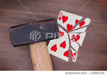 Hammer with a broken card, eight of hearts 13906168
