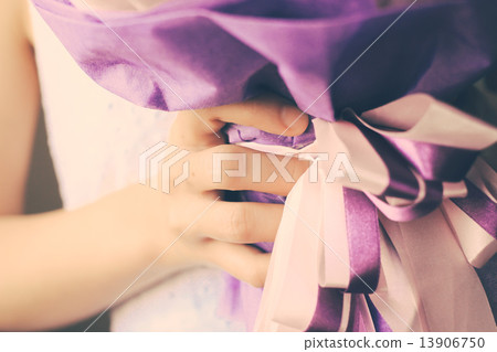 Bride or bridemaid with bouquet of flower, retro filter effect Bride or bridemaid with bouquet of flower, retro filter effect 13906750