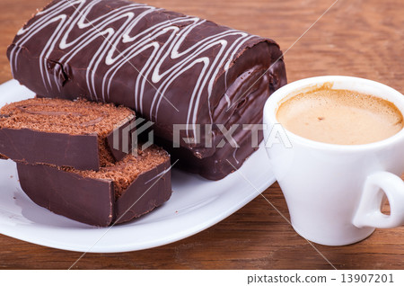 roll with a cup of coffee close-up 13907201