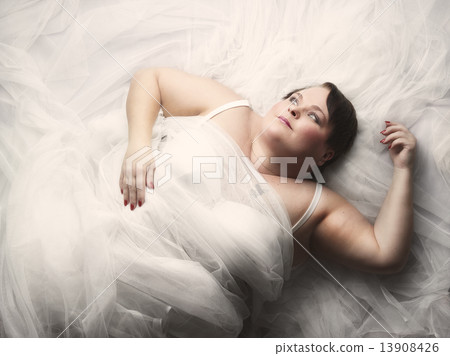 Woman and white tulle fabric Woman and white tulle fabric 13908426