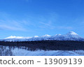 Shiretoko mountain range in winter seen from Flepe waterfall 13909139