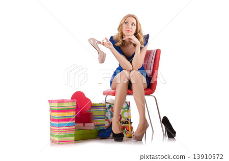 Woman trying new clothing after shopping 13910572