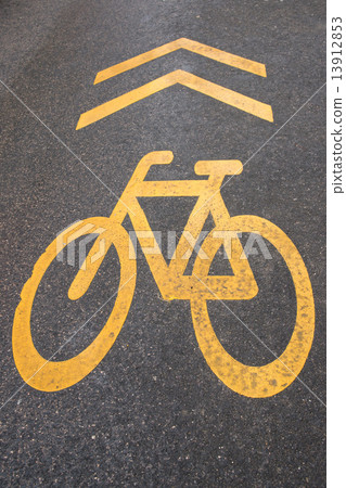 Bicycle lane sign on the road 13912853