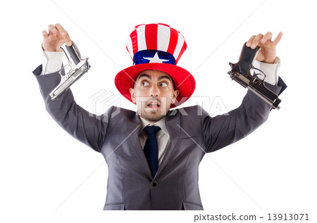 Man with gun and american hat 13913071