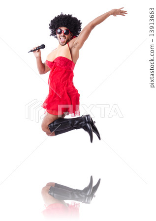 Man in female clothing singing with mic Man in female clothing singing with mic 13913663