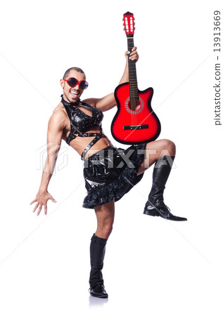 Man in woman clothing with guitar Man in woman clothing with guitar 13913669