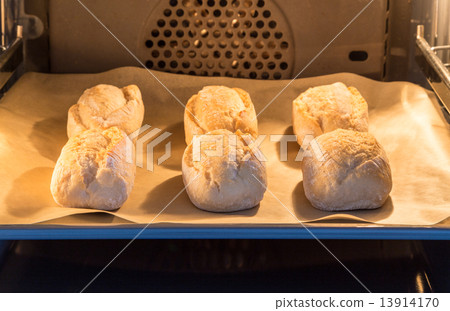 Buns are baked in an oven Buns are baked in an oven 13914170