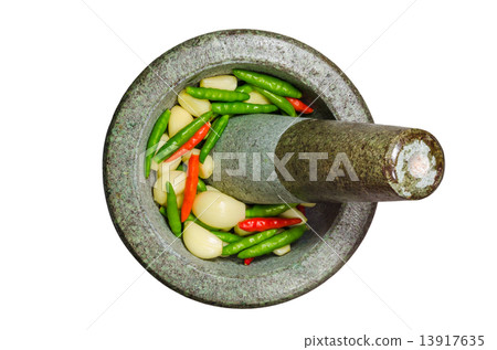 Garlic,Red and Green Chilli in stone mortar and pestle - isolate 13917635