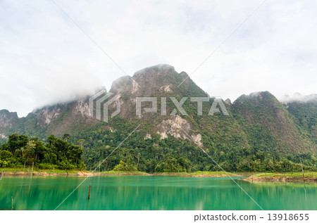 Beautiful high mountains and green lake 13918655