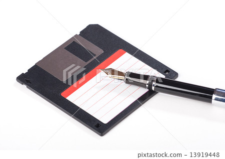 Old fllopy floppy disk and fountain pen 13919448