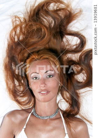 Portrait of the young woman with long hair Portrait of the young woman with long hair 13919681