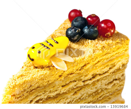 Piece of the honey cake decorated with a bee from glaze Piece of the honey cake decorated with a bee from glaze 13919684