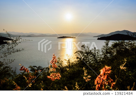 Landscape of the lake at sunset. 13921484
