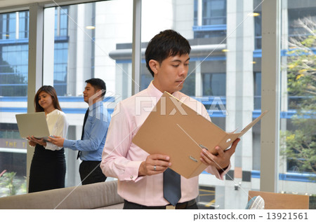 Asian business men discussing project on Laptop Asian business men discussing project on Laptop 13921561