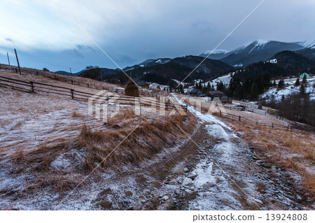Fantastic evening winter landscape. Dramatic overcast sky. Fantastic evening winter landscape. Dramatic overcast sky. 13924808