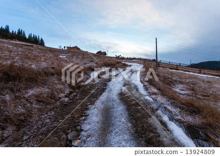 Fantastic evening winter landscape. Dramatic overcast sky. 13924809