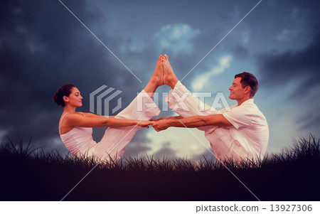 Composite image of peaceful couple sitting in boat position toge Composite image of peaceful couple sitting in boat position toge 13927306