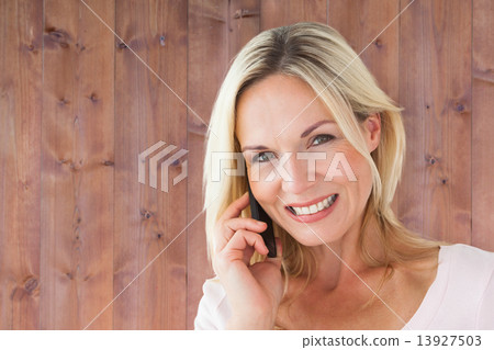 Composite image of happy blonde talking on the phone Composite image of happy blonde talking on the phone 13927503