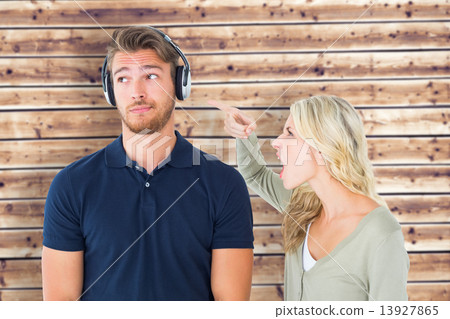 Composite image of young couple having an argument Composite image of young couple having an argument 13927865