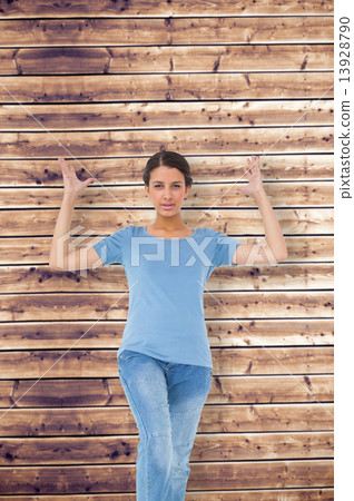 Composite image of annoyed brunette gesturing Composite image of annoyed brunette gesturing 13928790