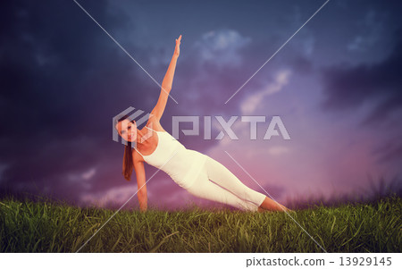 Composite image of fit woman doing pilate exercises in the fitne 13929145