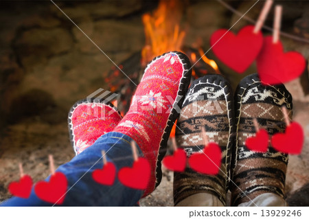Composite image of close up of romantic legs in socks in front o Composite image of close up of romantic legs in socks in front o 13929246