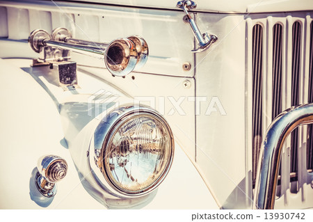 Old retro or vintage car front side. Vintage effect processing 13930742